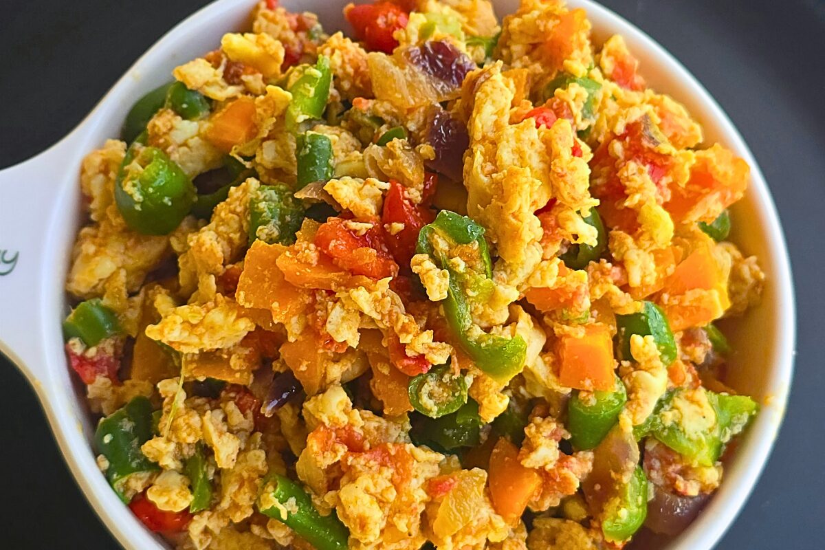 Egg sauce and rice served together for a filling Nigerian meal