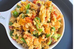 Finished egg sauce recipe in a pan, ready to serve with yam, rice, or plantain