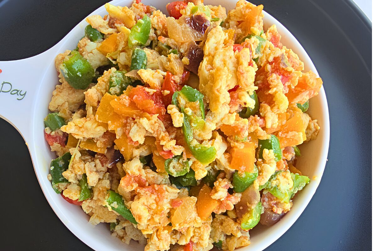 Finished egg sauce recipe in a pan, ready to serve with yam, rice, or plantain
