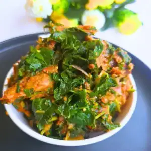 Goat meat and blanched vegetables combined in pepper-tomato base, simmering together